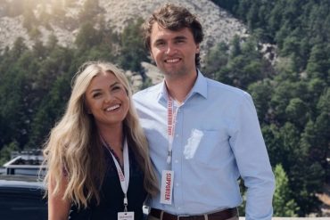 Charlie Kirk wife at Utah confirmation event with mountain backdrop and lanyards