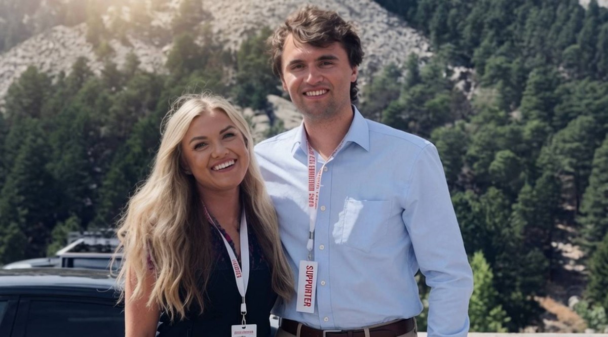 Charlie Kirk wife at Utah confirmation event with mountain backdrop and lanyards