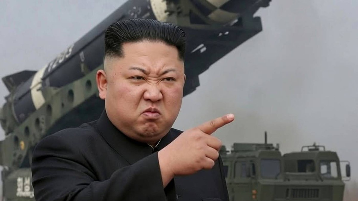 Clickbait military propaganda image with person pointing at missile launcher