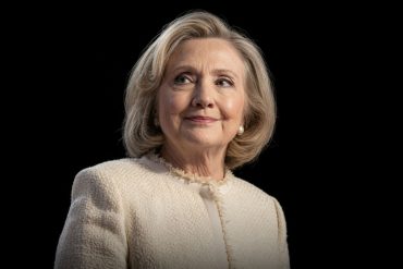 Senior woman in cream cardigan, Hillary Clinton White House criticism topic