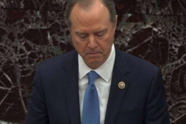 Serious government official in formal suit during Iran war debate proceedings