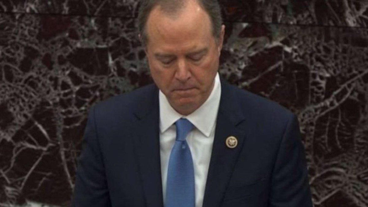 Serious government official in formal suit during Iran war debate proceedings
