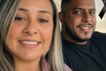 Missing couple portrait with black ribbon memorial symbol