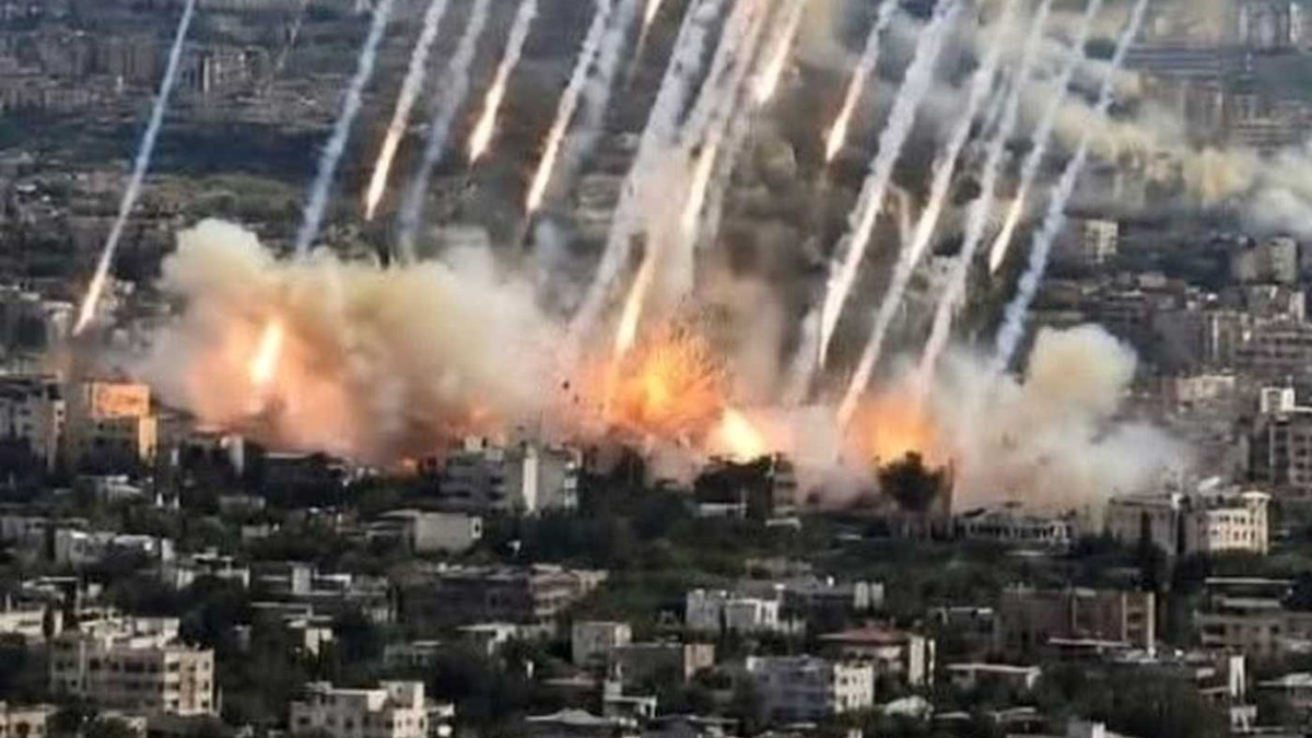 Aerial view of rocket attack Los Angeles showing multiple missiles striking urban area with explosions and smoke