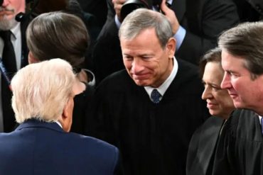 Supreme Court justices and officials at formal government event discussing AT&T Verizon location data fines