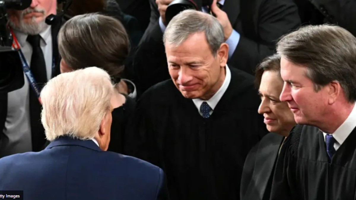 Supreme Court justices and officials at formal government event discussing AT&T Verizon location data fines
