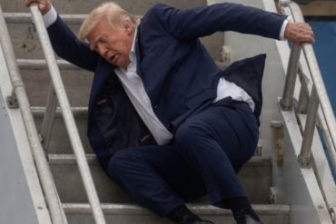 Man in dark suit stumbling on stairs fueling Trump health rumors and speculation