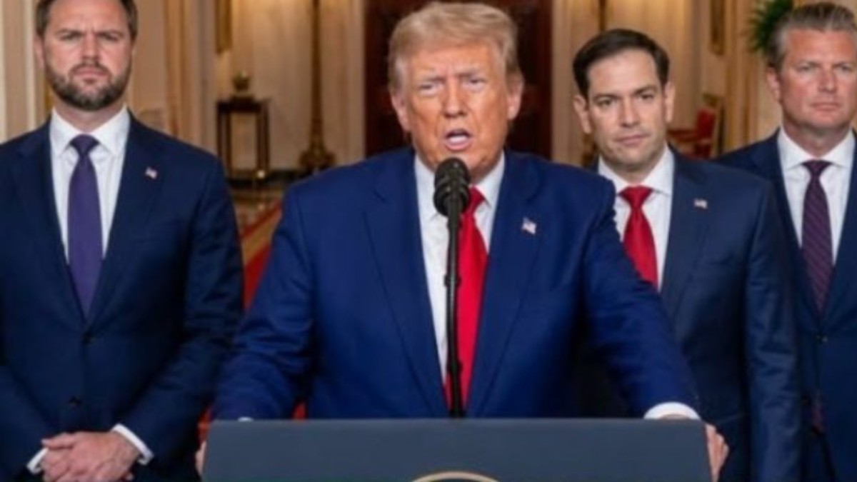 US officials at podium discussing US-Iran nuclear deal negotiations and foreign policy