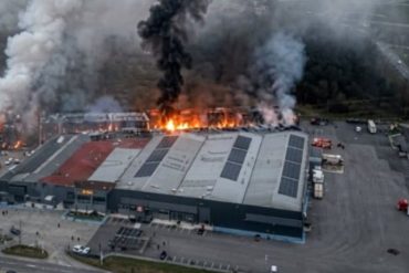 Aerial view of the Violanta biscuit factory fire Greece showing massive flames and smoke billowing from the industrial facility