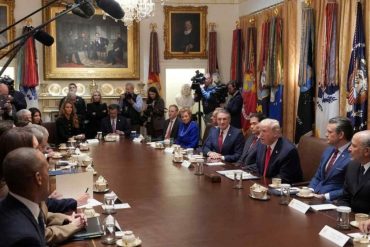 Top diplomat in Trump admin leaving State Dept during formal cabinet meeting in ornate government room